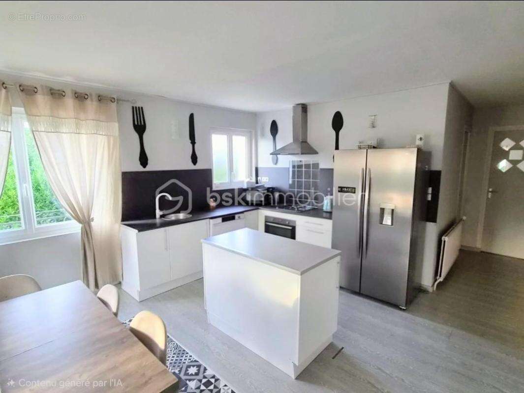 Une maison aux nombreux atouts, offrant espace, luminosité et une terrasse à aménager - photo 2