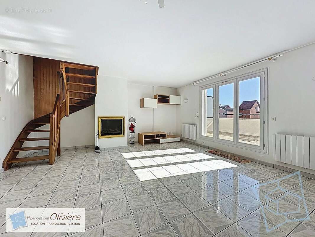 Appartement à VOISINS-LE-BRETONNEUX