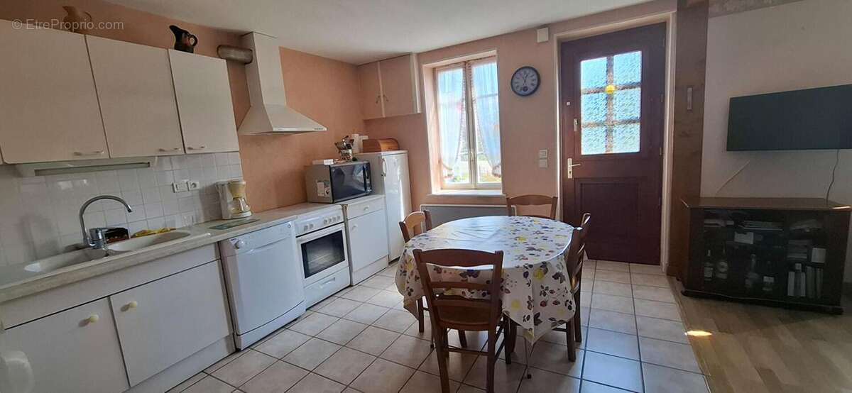 Maison en village 70 m2 joli terrain - photo 3