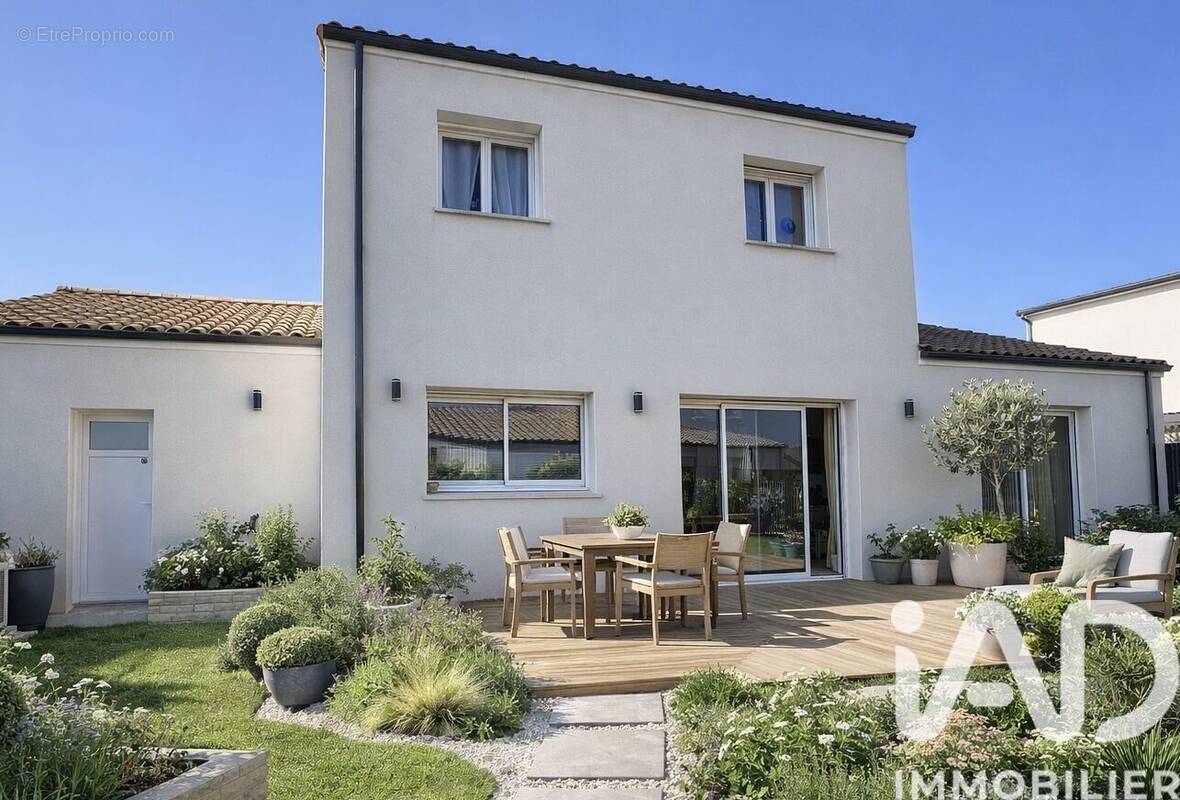 Photo 1 - Maison à SAINT-JULIEN-DE-CONCELLES