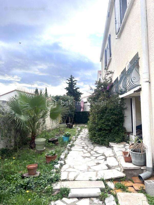 Appartement de 109 m2 avec jardin privatif terrasse et garage - photo 7