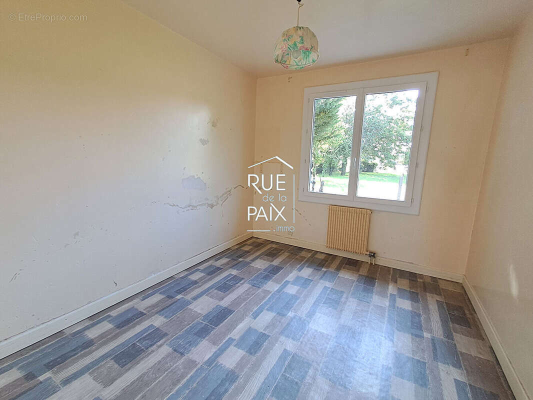 Maison de plain pied 4 chambres Serigny + Jardin de plus de 1600 m² - photo 10