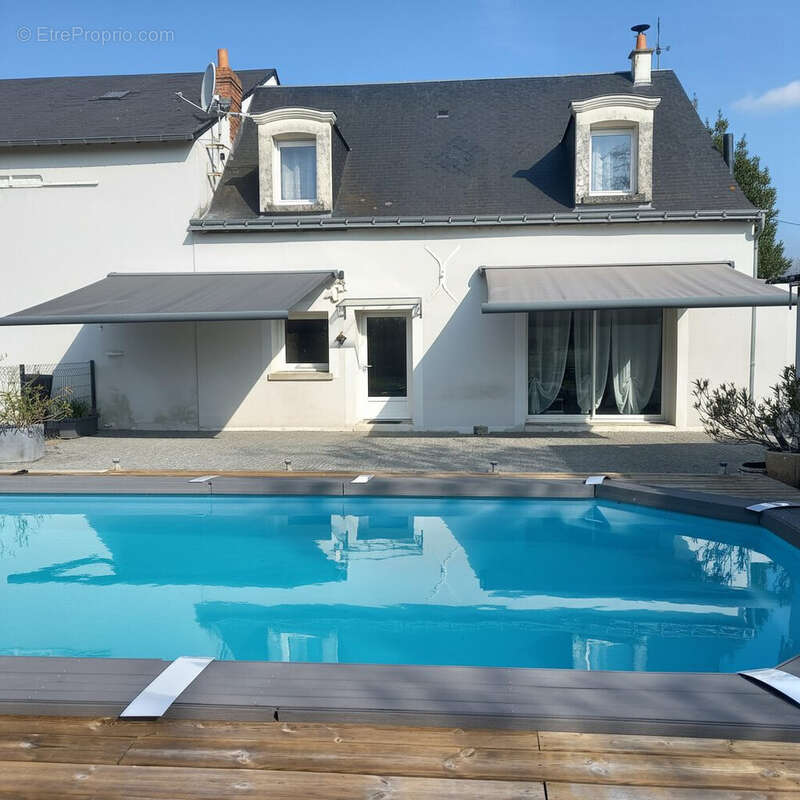 Maison à MONNAIE