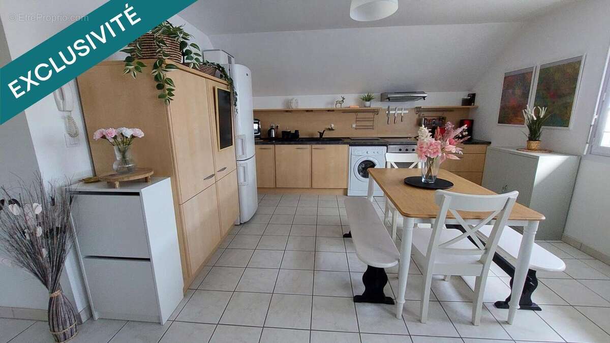 Photo 2 - Appartement à FLEURY-LES-AUBRAIS