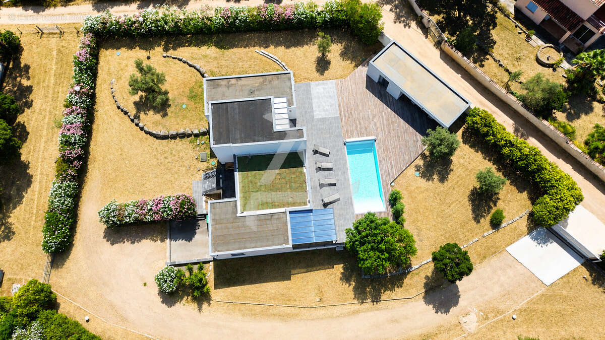 Villa t7 de 211m2 contemporaine avec piscine sous-sol aménagé et chambre indépendante - photo 4
