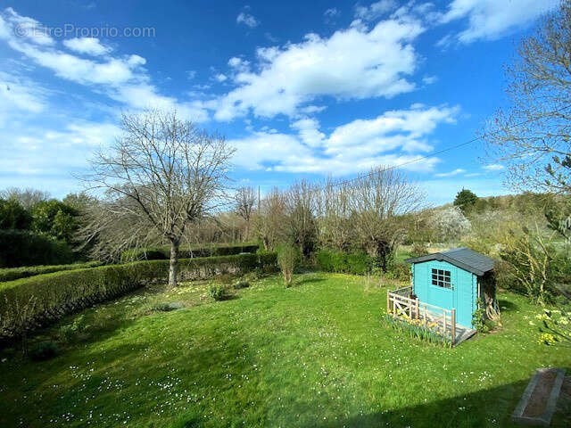Maison de charme de 79,21 m2 habitables et de 88 m2 au sol avec cheminee, dependance/serre de 12m2 et jardin - photo 4