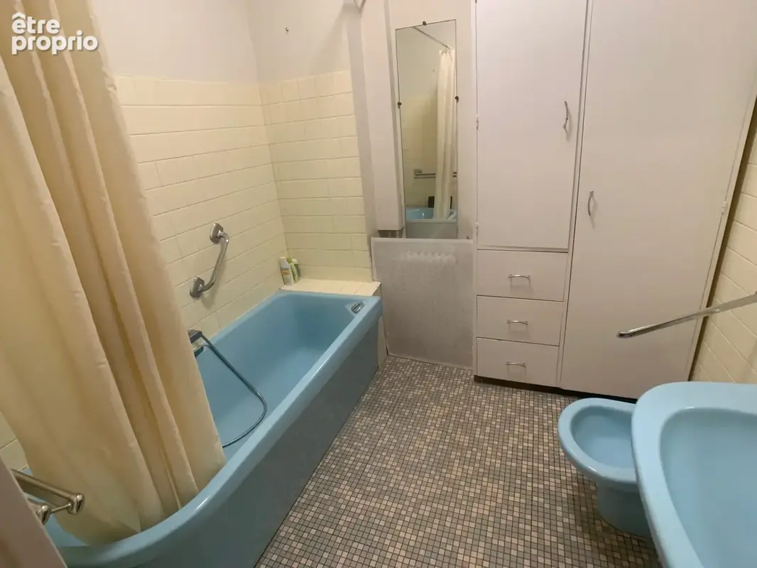Appartement hyper centre Montluçon T5, 3 chambres, avec cave et parking couvert privé - photo 8