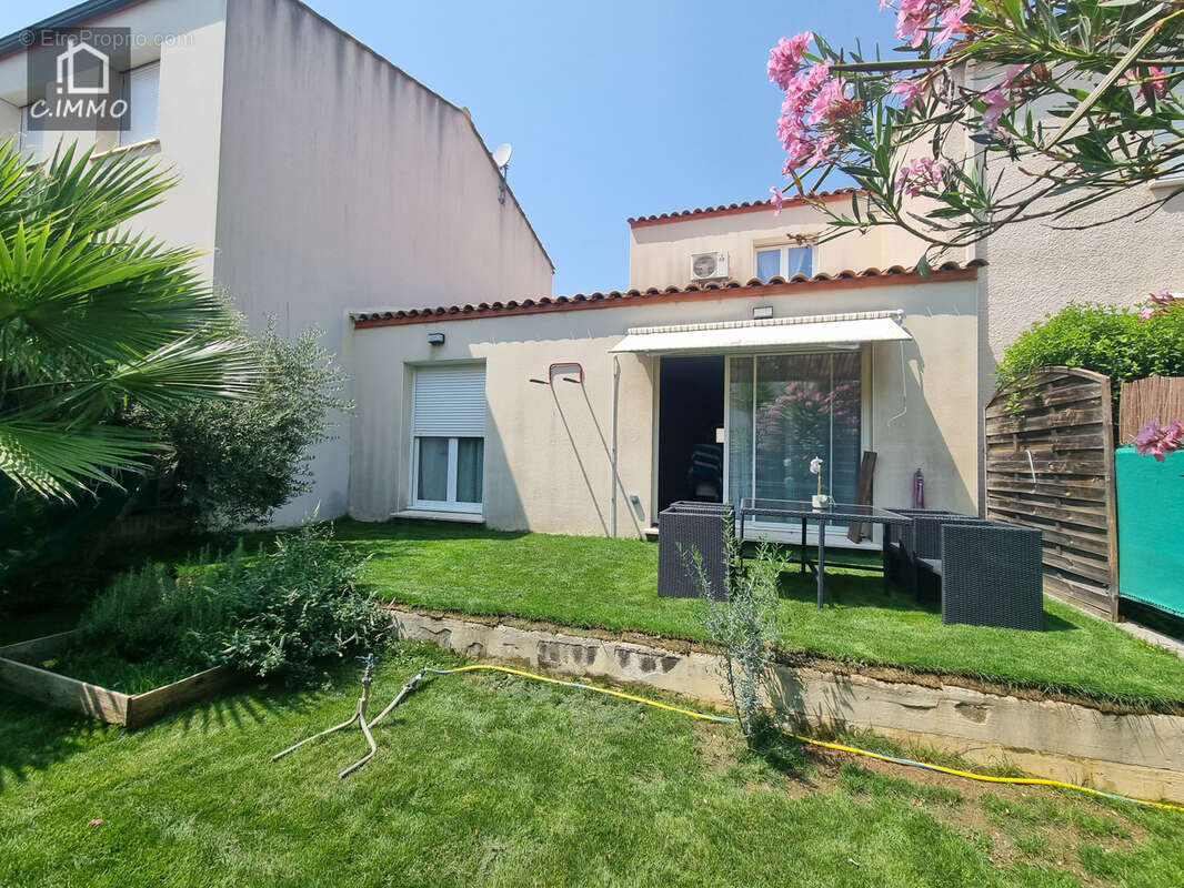 Villa R+1 de type 4 de 87.40 m2 avec garage et jardin - photo 2