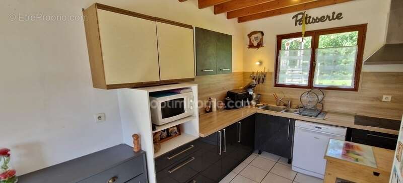 Maison contemporaine 125 m², Terrain de 1600 m² – DPE A – 4/5 ch. + sous-sol – Plein Sud à 2.5 km des commodités et 10 mn de St  - photo 6