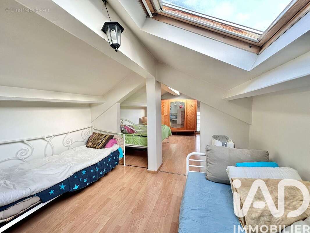 Photo 3 - Appartement à SAINTE-GENEVIEVE-DES-BOIS