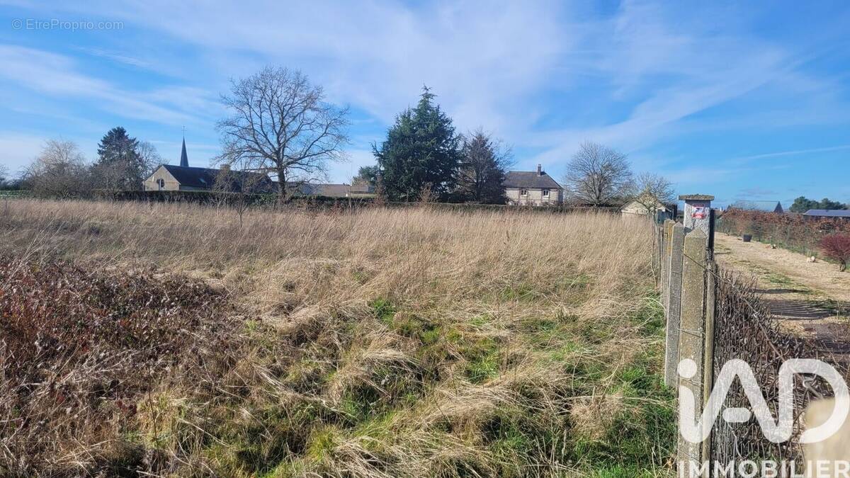 Photo 1 - Terrain à SAINT-ANDRE-DE-L'EURE