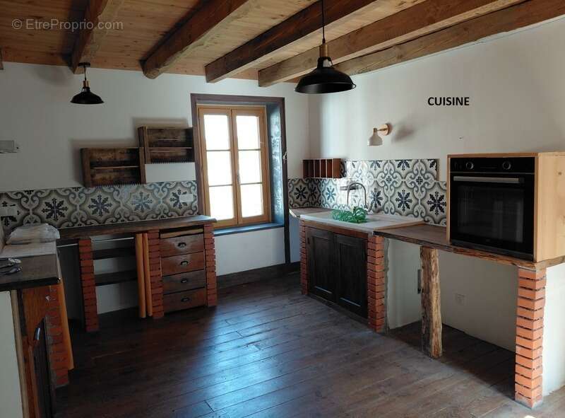 Grande maison rénovée de 220 m² avec atelier, terrasse panoramique et verger – Mourjou (Puycapel  cantal) - photo 14