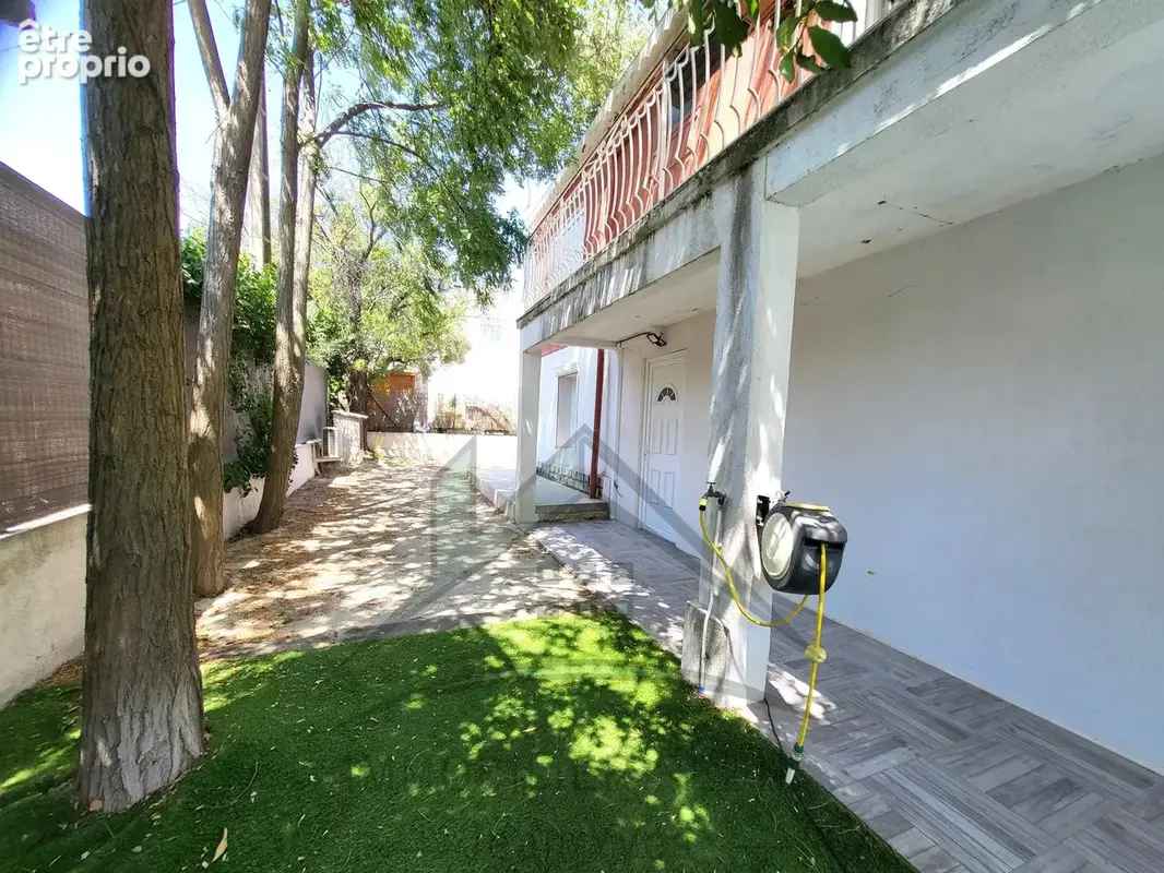 Bas de villa de 115 m2   type 4   terrain de 470 m2   cuisine d’été - photo 6