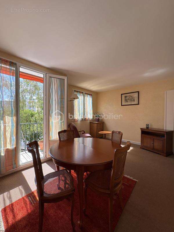 Appartement 70 m² – 3 chambres – Balcon – Parking en box – Cave – Résidence sécurisée - photo 4