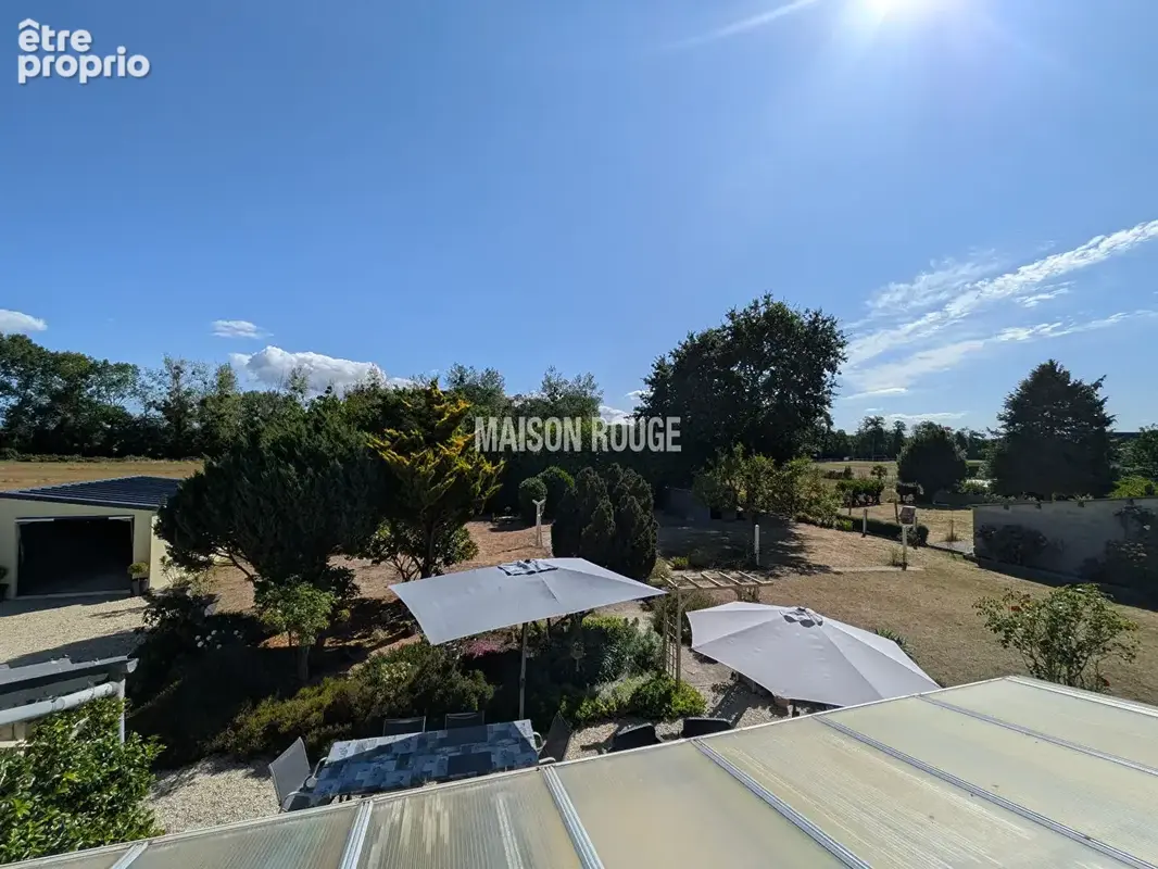 Élégante maison en pierres rénovée à Saint-Lormel avec 4 chambres et vaste terrain constructible - photo 8