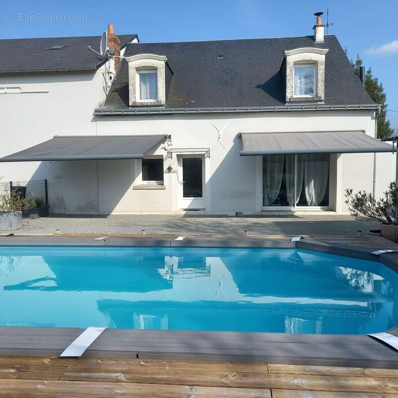 Maison à MONNAIE