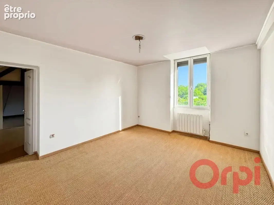  Maison de caractère à vendre à Épineuil-le-Fleuriel – Pierre apparente - photo 6