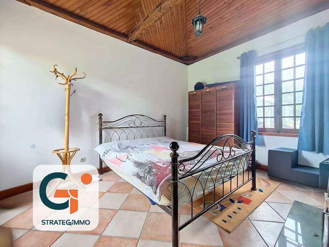 Maison à SAINT-OUEN-DE-THOUBERVILLE