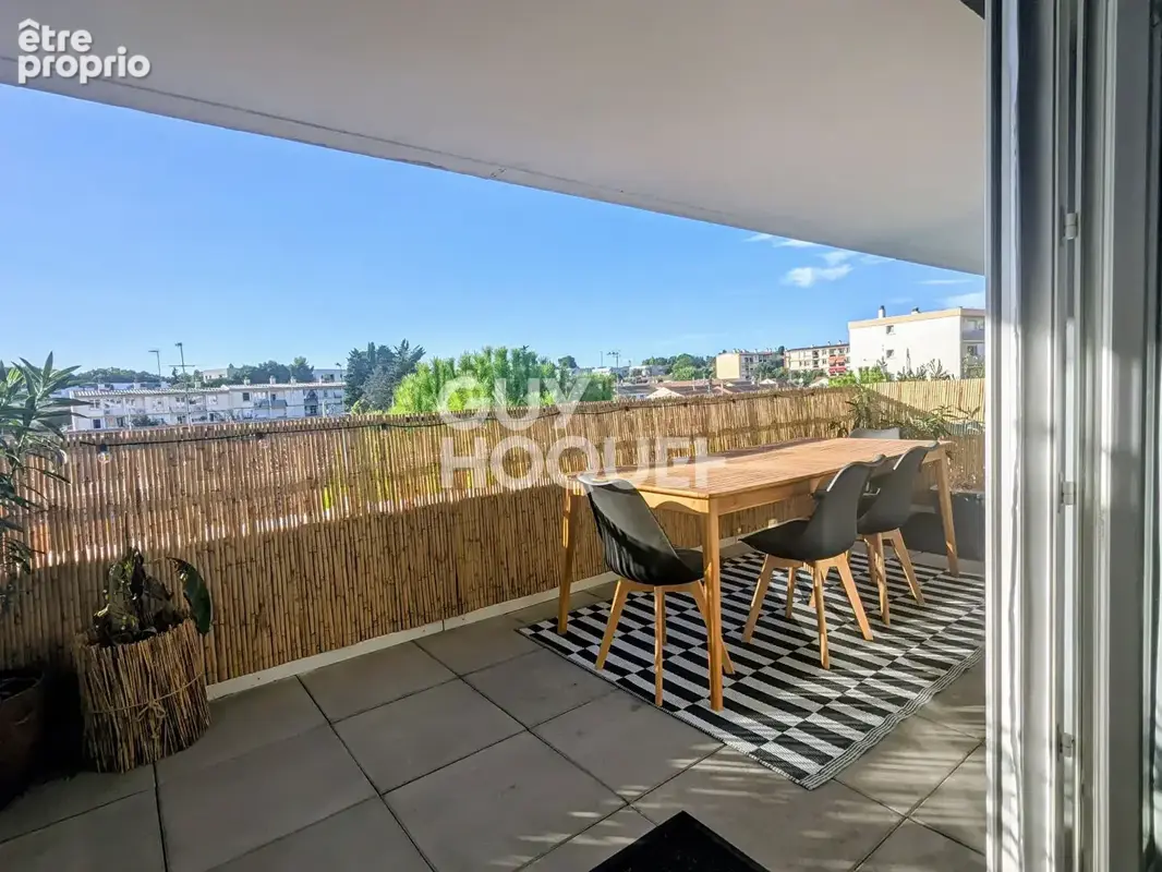 Appartement T3 Près d'Arènes 65 m2 + double terrasse + garage - photo 2