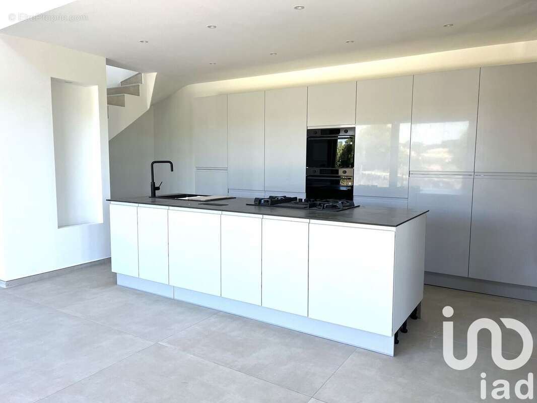 Photo 3 - Maison à LAUDUN-L&#039;ARDOISE