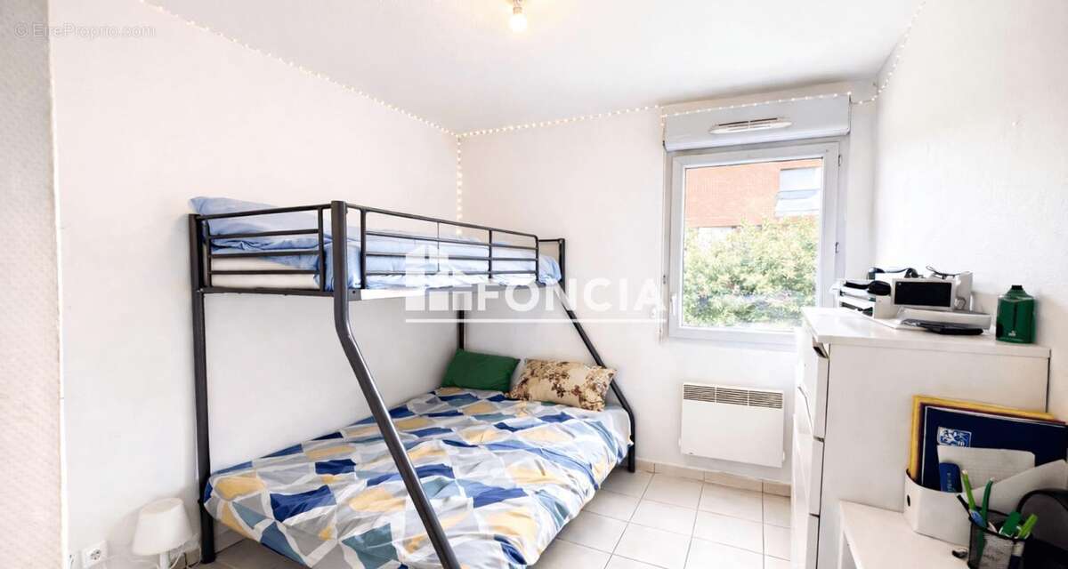 TOULOUSE - Appartement T4 - Box et place de parking en sous sol - photo 3
