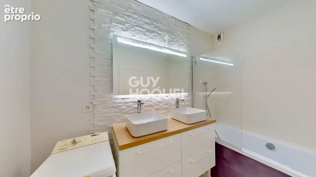 T3 de 74 m², Ancien T4, Deux balcons, Cave - photo 8