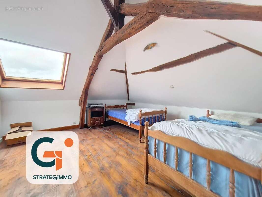 Maison à SAINT-OUEN-DE-THOUBERVILLE