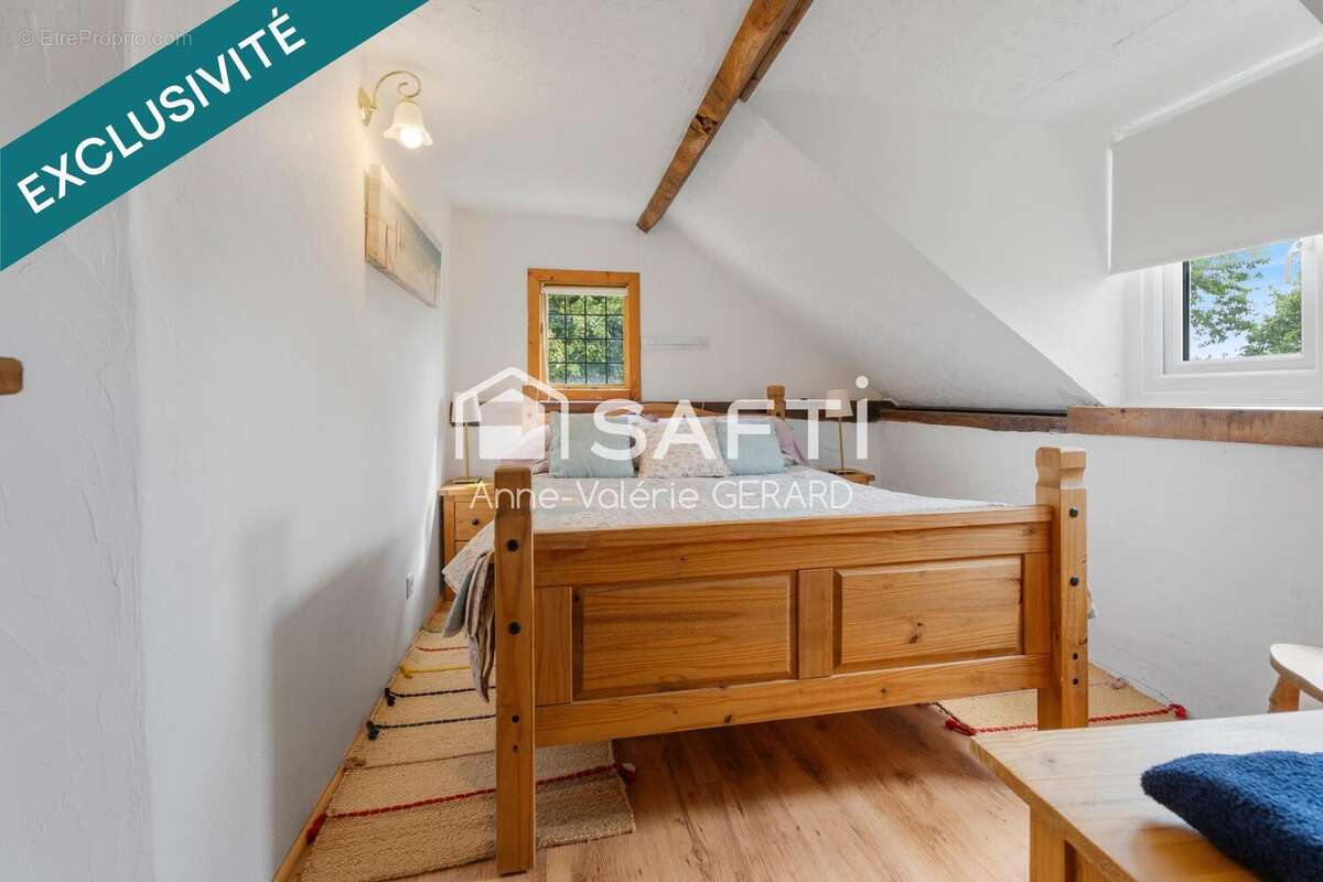 Photo 8 - Maison à JUVIGNY-LE-TERTRE