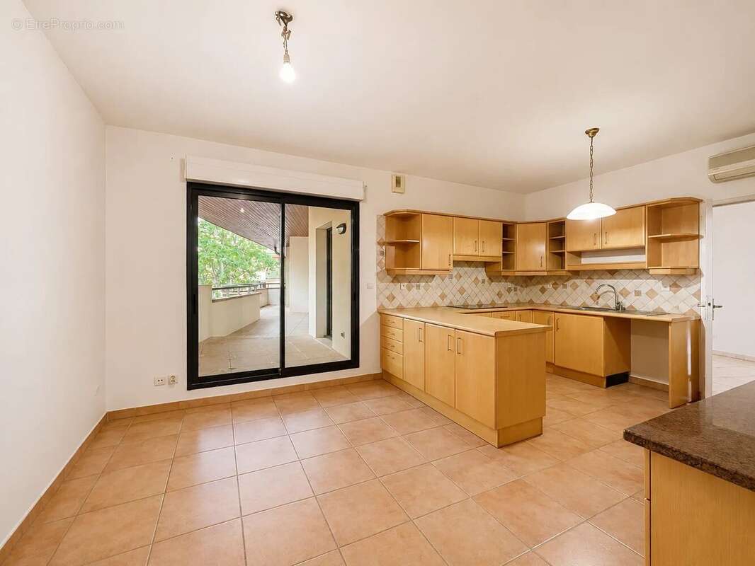 Appartement T5 de 176 m² avec terrasse, ascenseur, double garage et climatisation - Quartier Jean Jaures - photo 3