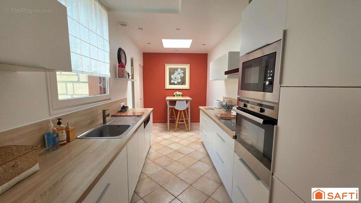 Photo 8 - Maison à SAINT-QUENTIN