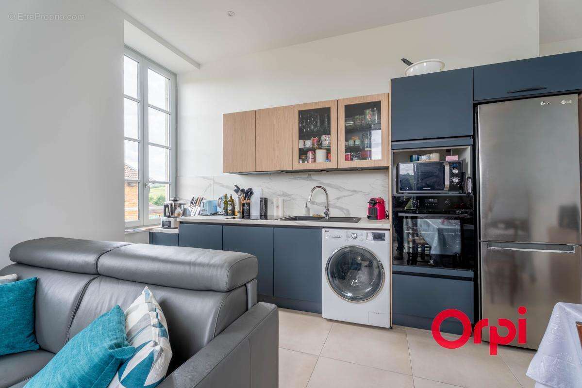 T2 rénové de 40 m² dans une bâtisse en pierres dorées - photo 6
