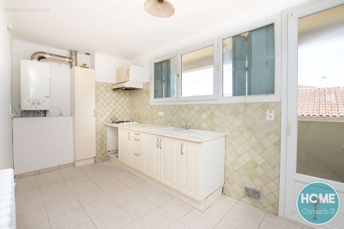 Appartement T4 97 M2 avec garage - photo 4