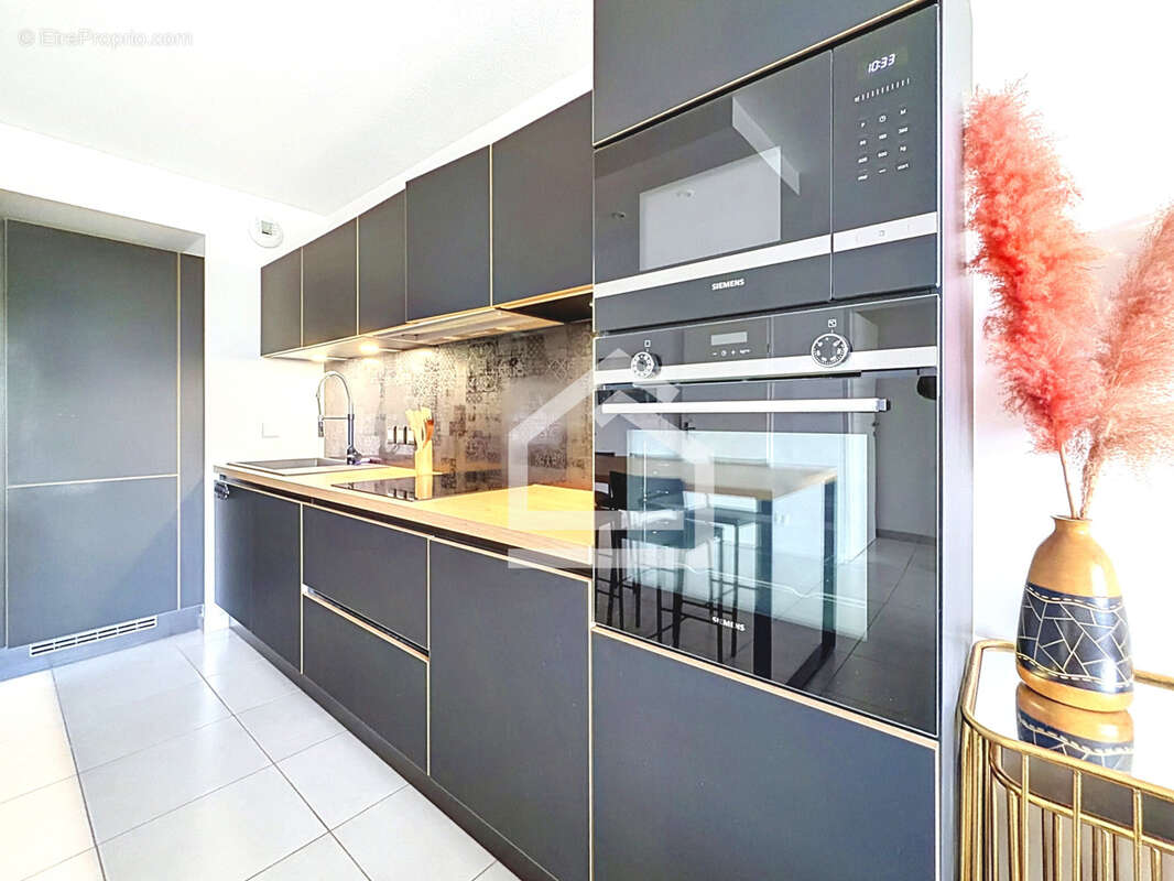 Appartement contemporain 4 pièces avec balcon au sein d'une résidence récente - photo 18