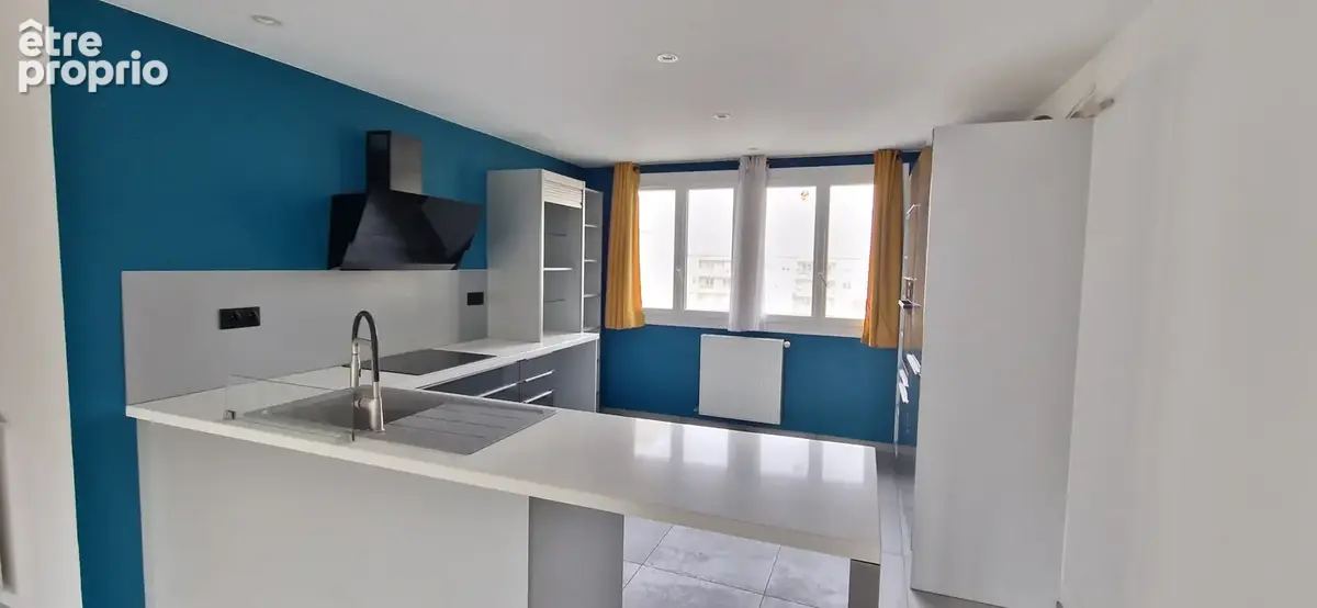 Appartement T4 - balcon - garage et cave - photo 1