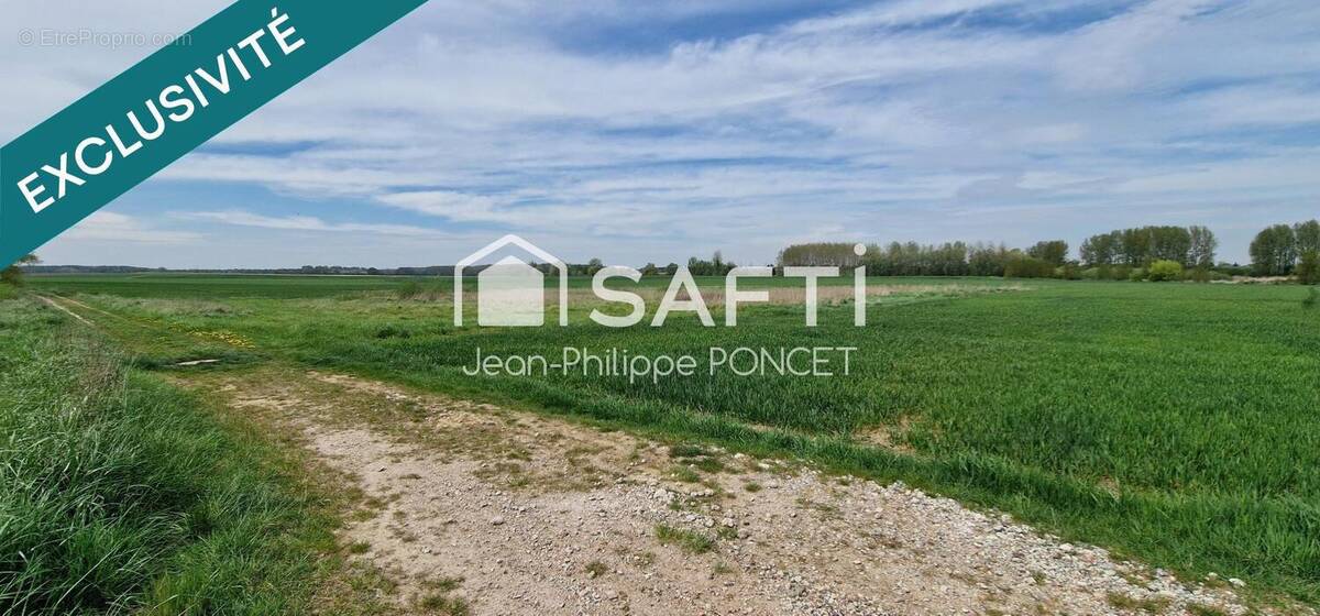 Photo 1 - Terrain à JUSSY