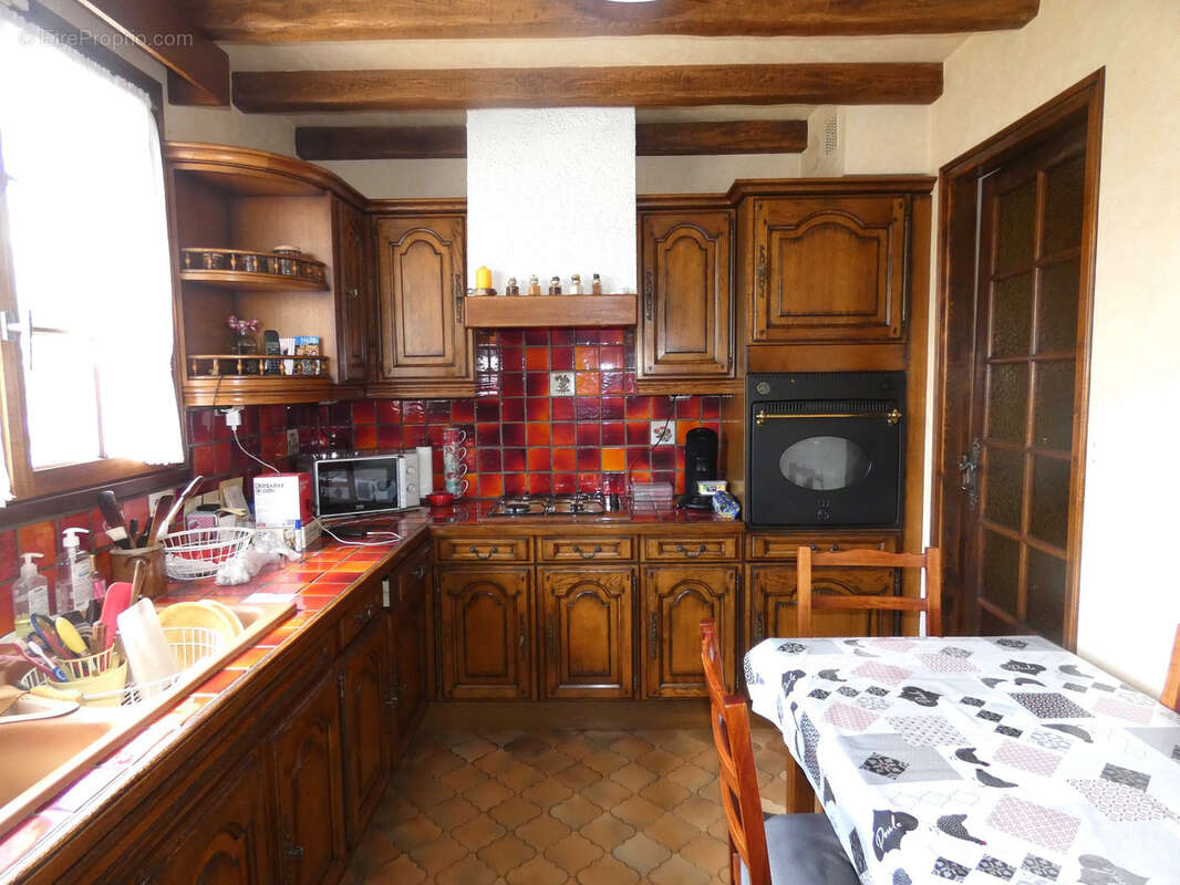 Maison à US