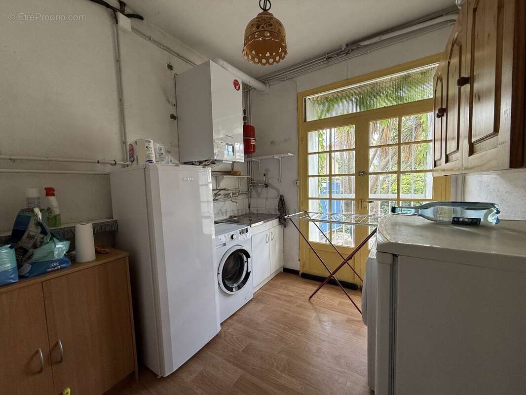 Maison en trois faces sur deux niveaux avec Garage. - photo 19