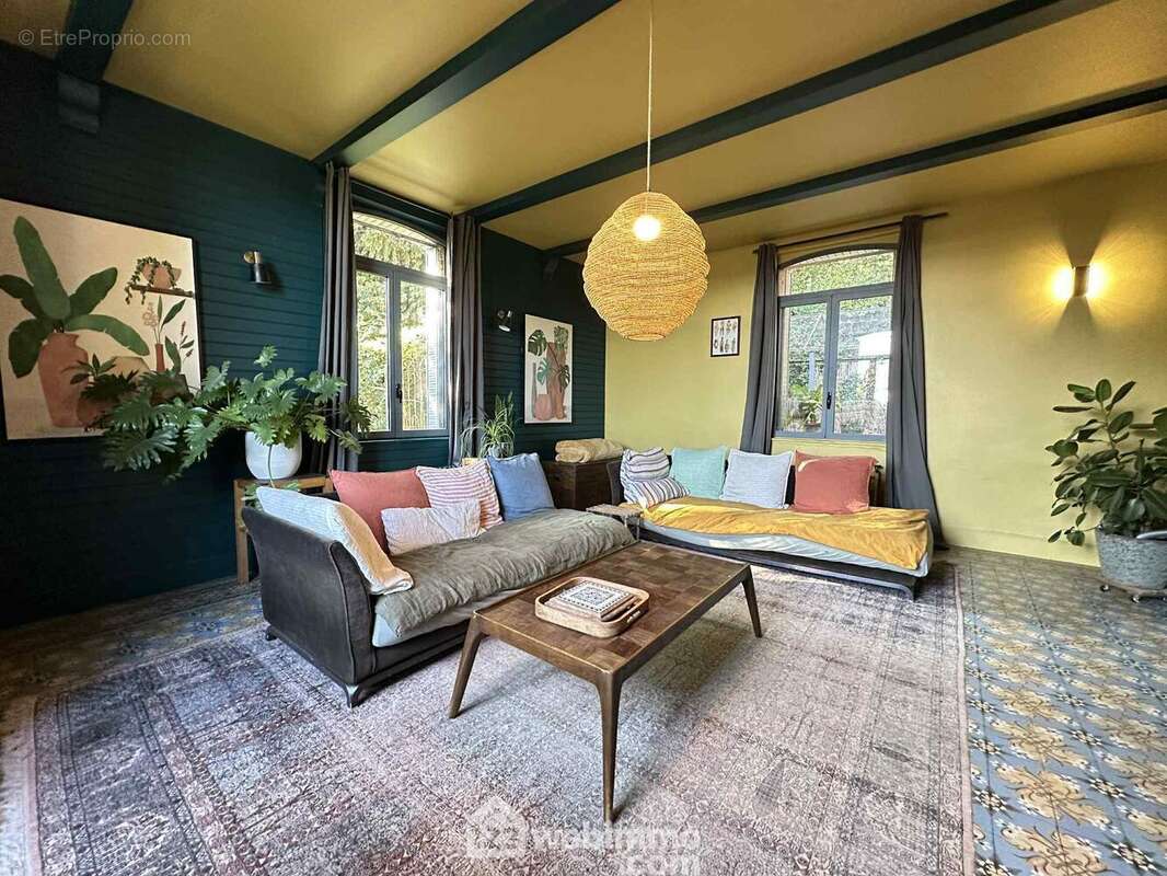 Le salon lumineux de 32 m² - Maison à LAON