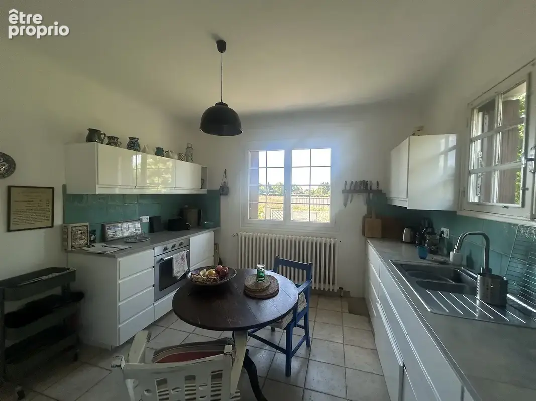 Maison de 4 chambres, avec sous-sol et garage - photo 4