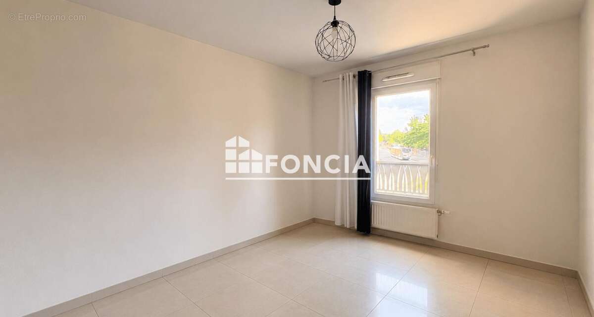 À vendre appartement T4 lumineux avec balcon et garage box – Proche centre de Neuville-sur-Saône - photo 6