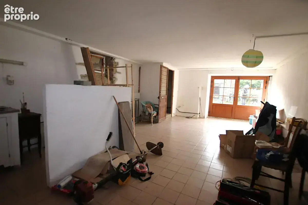 Ensemble immobilier avec gîte et potentiel second gîte - Maison T7 de 211 m² sur terrain arboré - photo 17