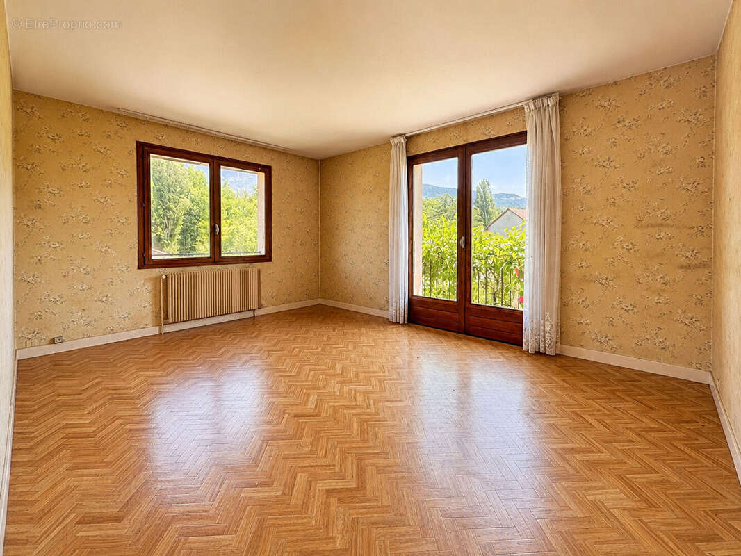 Maison  5 pièces de 101 m2 + sous-sol  à ARCHAMPS - photo 5