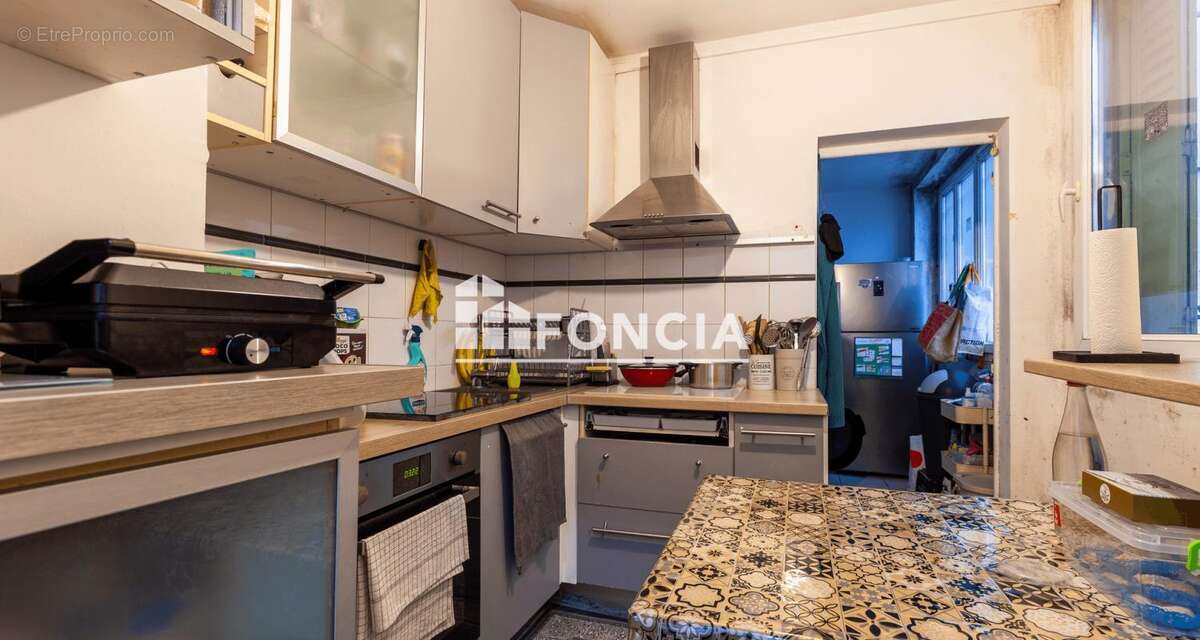 Appartement T3 en rdc surelevé - photo 2