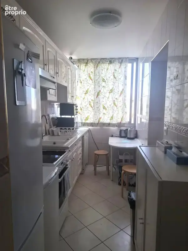 75013 appartement 3/4 pieces 63.48 m² avec une cave et un parking - photo 3