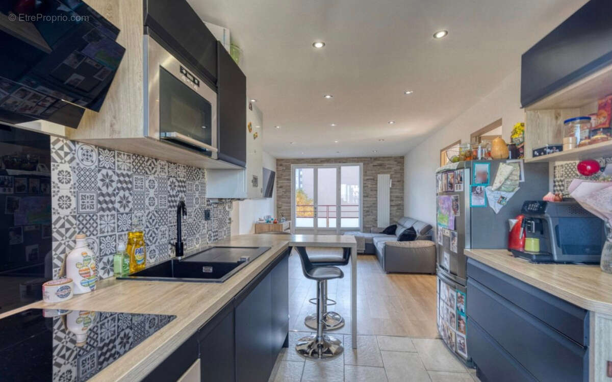 HIDRI IMMO PLUS vous propose un appartement T4 avec balcon et cave à Saint-Martin-d'Hères - photo 5