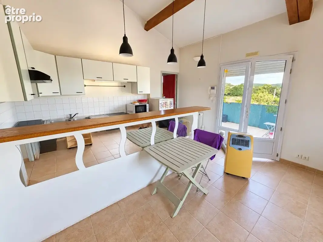 Appartement 6 pièces 103 m² à vendre à Saint-Quentin-La-Poterie (30700) - photo 4