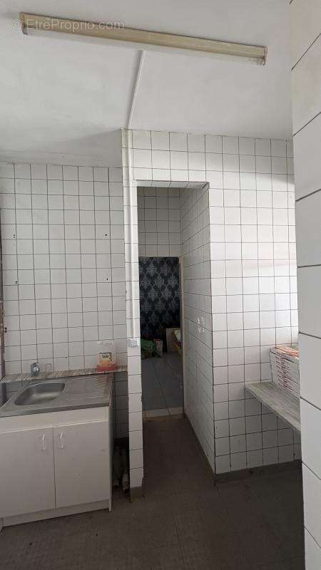 Opportunité à Saisir à Commentry (03) : Immeuble Mixte - Local Commercial + Habitation à l'Étage - photo 14