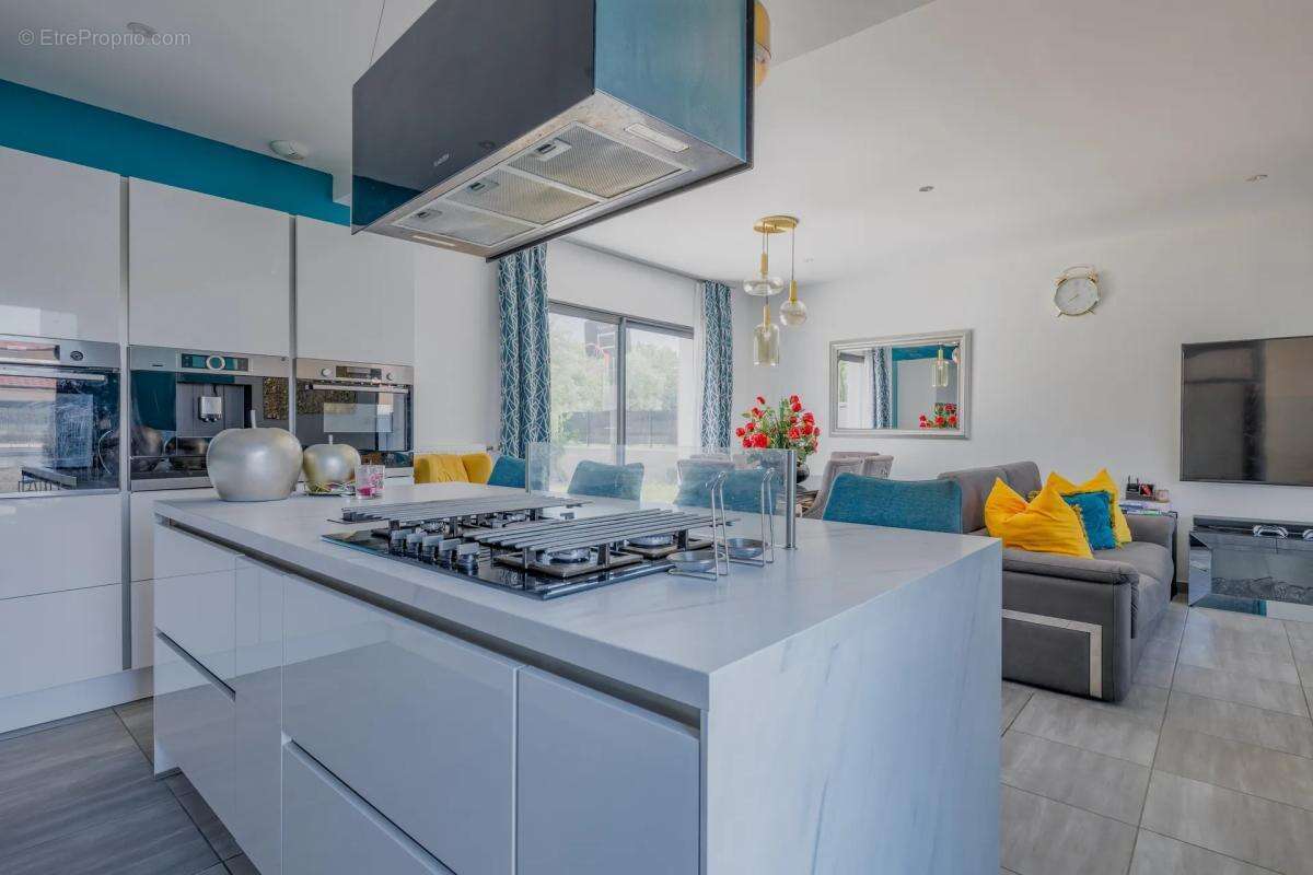 Maison de 6 pièces de 128 m² à Charvieu-Chavagneux - photo 5