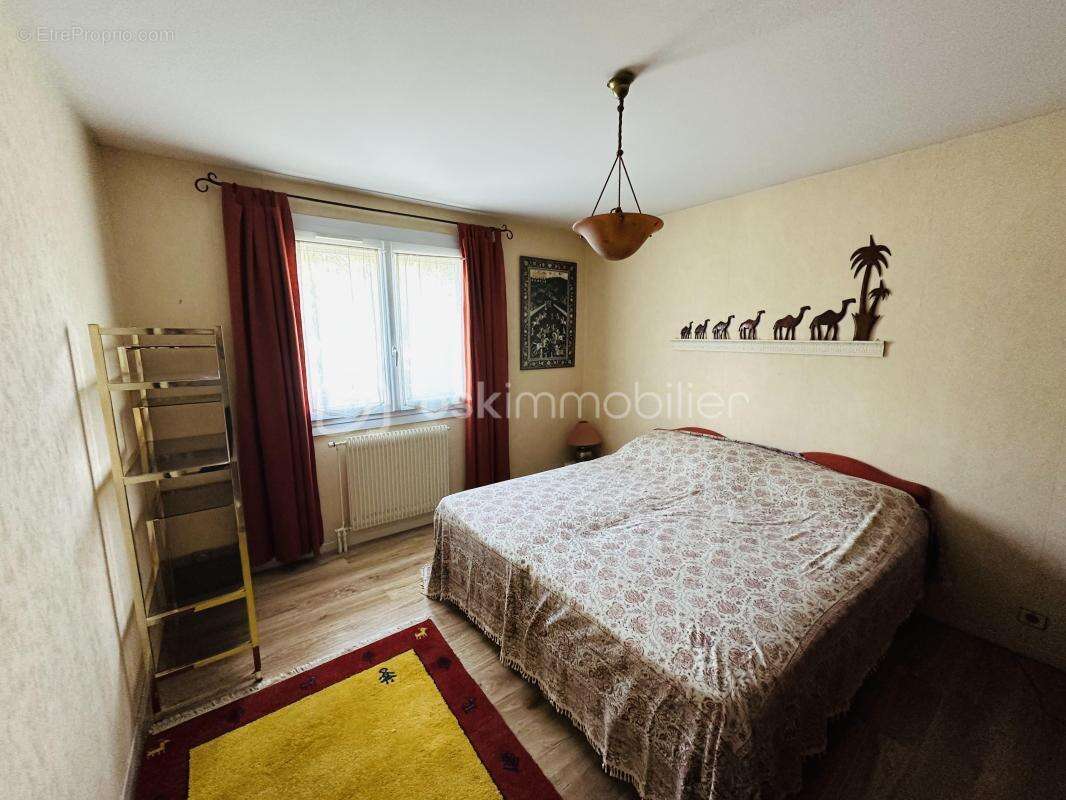 Appartement en rez de jardin avec garage + place de parking privative - photo 8