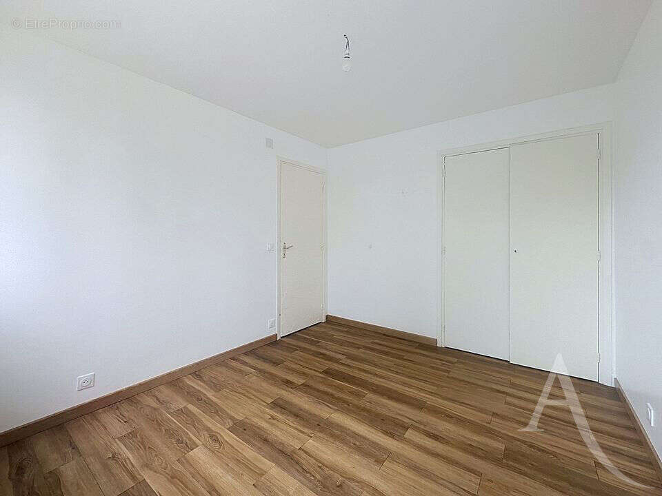 EXCLUSIVITÉ - Appartement F3 56 m² avec balcon, 2 chambres, cave et cuisine équipée - photo 4